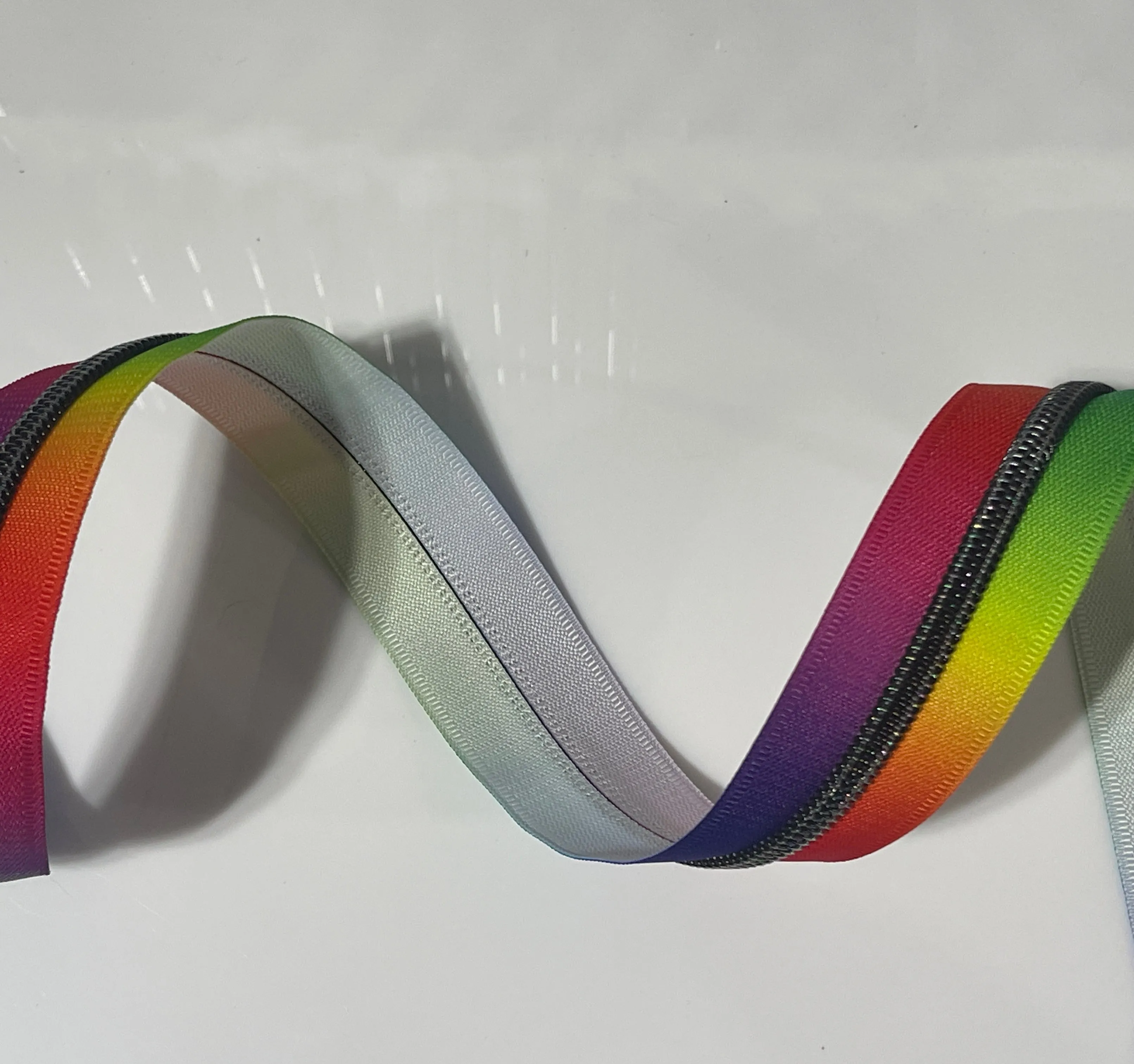 #5 Zipper Tape - 3 yard cut - Rainbow w/ Black Iridescent Teeth