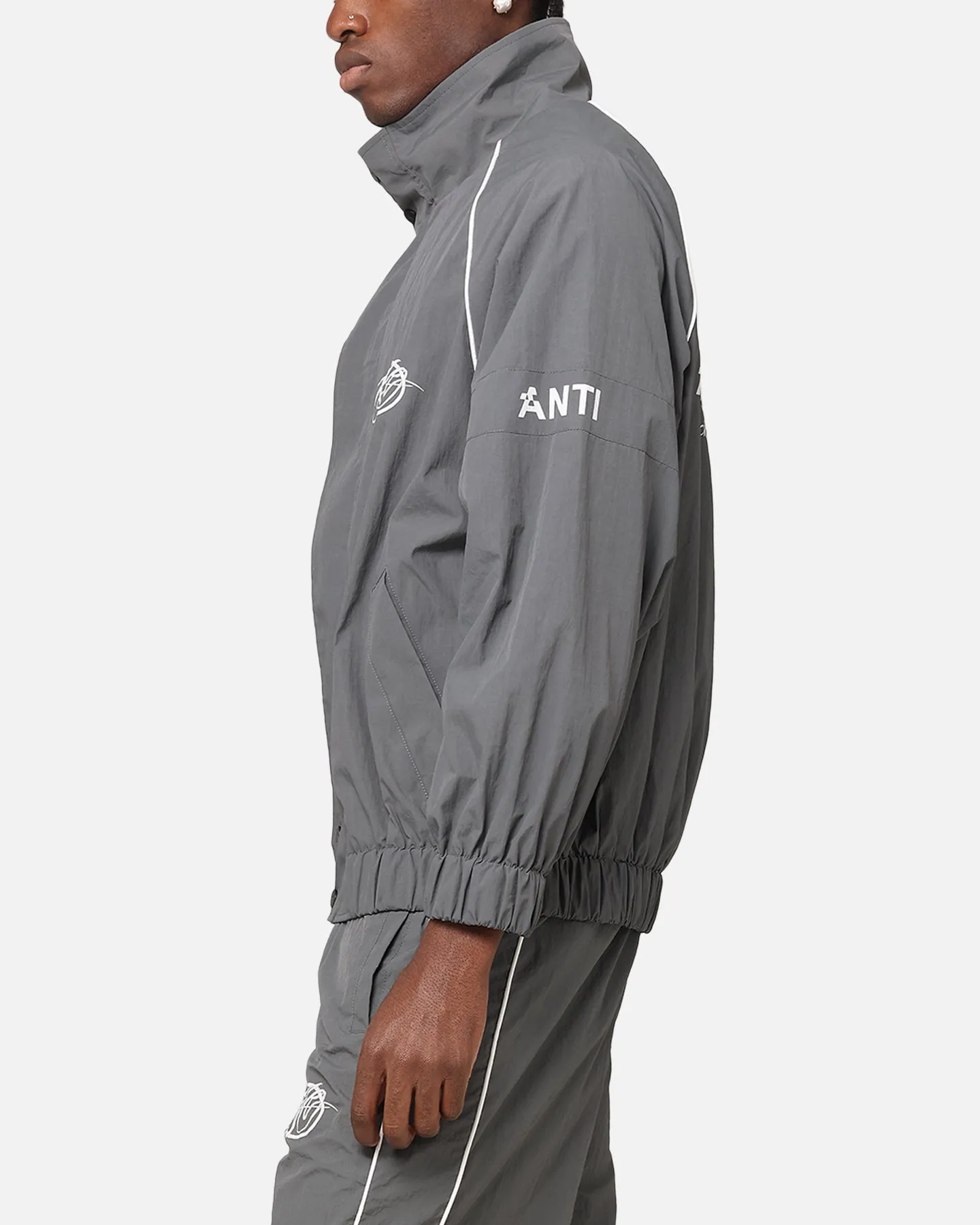 The Anti Order Track Club Windbreaker Jacket Dark Grey/Grey